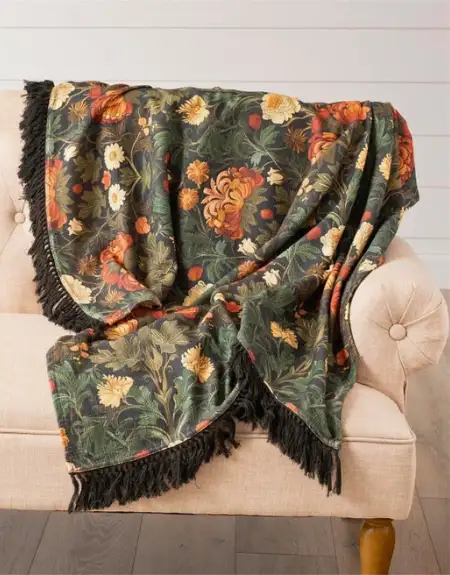 Floral woven throw blanket draped on chair at Lancaster Home and Fabric store in Lancaster County PA