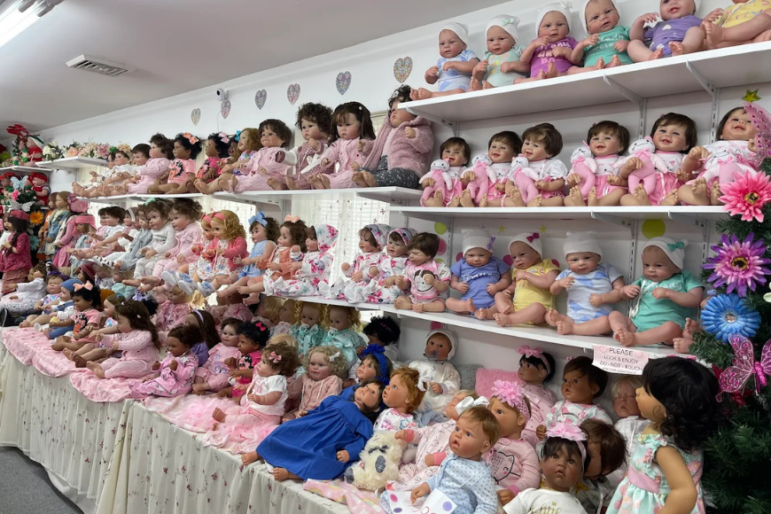 Walls of reborn baby dolls on display at Aimee and Daria's Doll Outlet in Lancaster PA