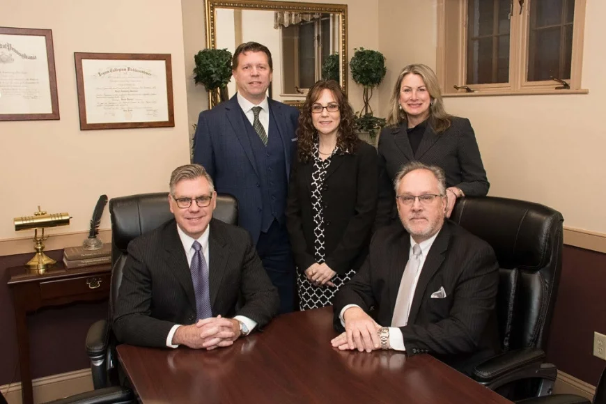 Gardner & Stevens PC full legal team group photo in Lancaster PA law office