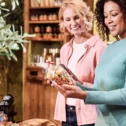 Women shopping for gourmet food gifts at Kitchen Kettle Village gift shop in Lancaster County PA