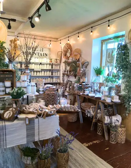 Cozy bohemian gift shop interior with candles and botanicals at Best Kept Secrets Lancaster County PA