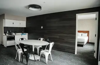 Modern suite with kitchenette and dining area at Dutch Wonderland Inn hotel in Lancaster PA