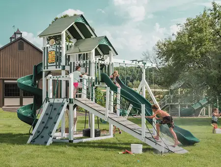 King Swings Galaxy swing set with slide and climbing wall for backyard playgrounds in Lancaster PA