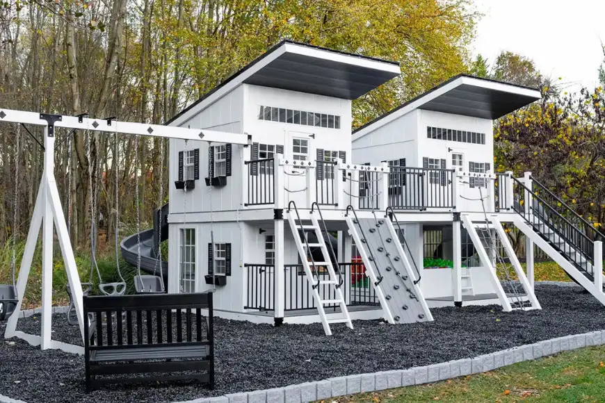 King Swings Everwilde two-story luxury playhouse with swing set and slide for backyard playgrounds in Lancaster PA