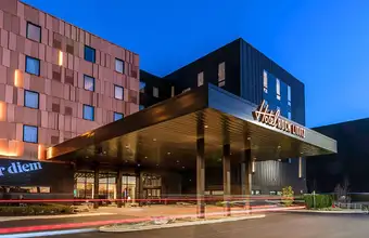 Modern exterior of Hotel Rock Lititz illuminated at night, contemporary hotel near Lancaster PA