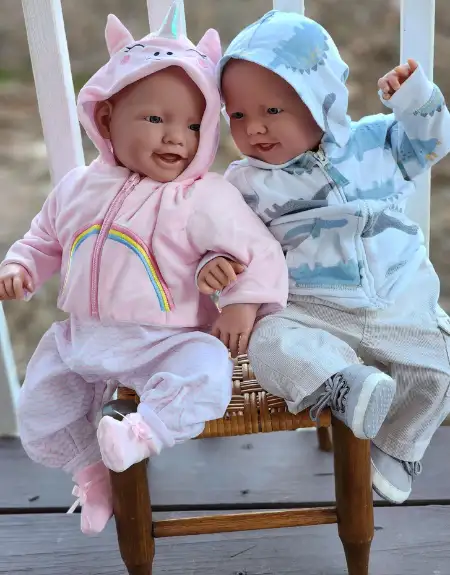 Lifelike reborn baby dolls in animal onesies available at Aimee Daria in Lancaster County PA