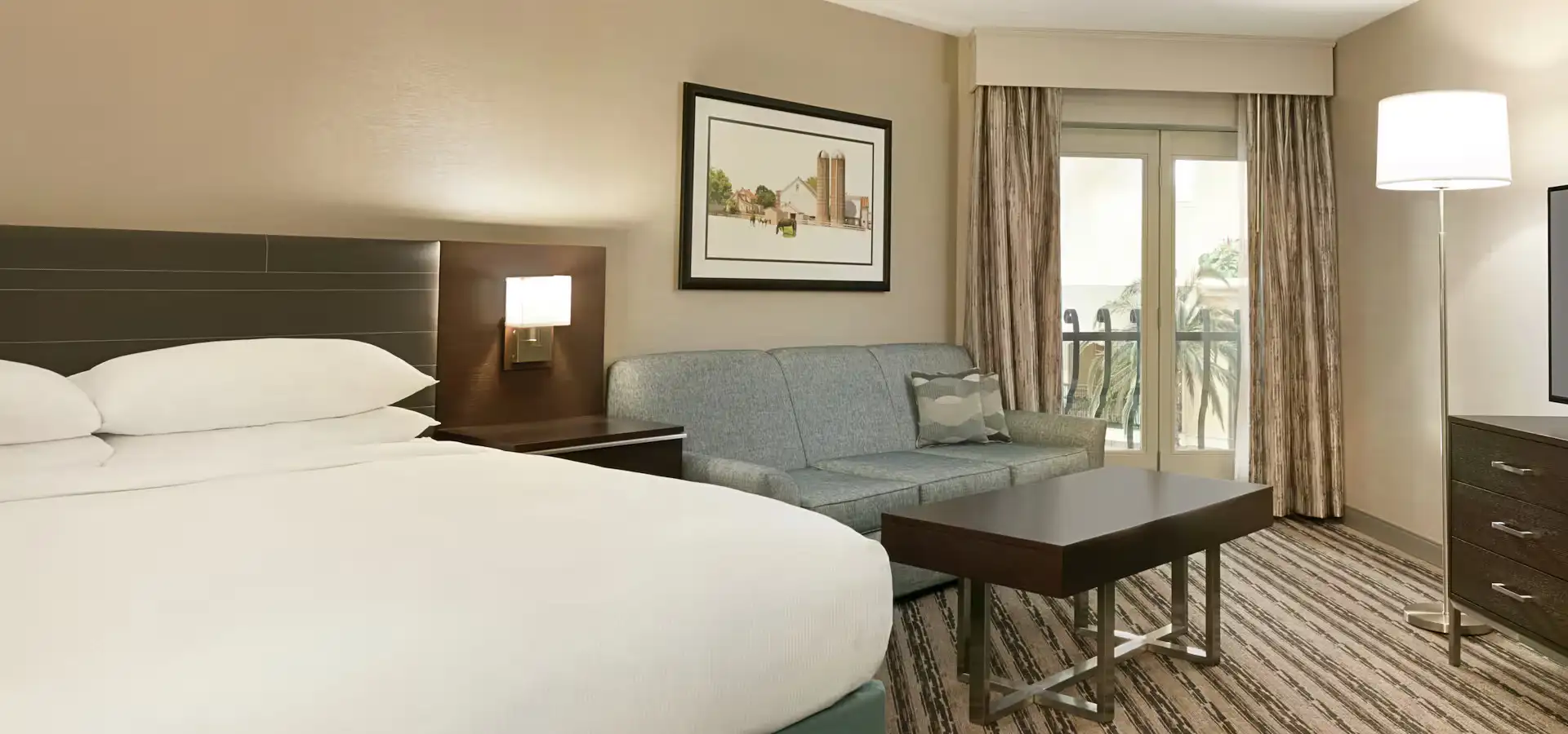 Pet-friendly hotel room with sitting area at DoubleTree Resort by Hilton in Lancaster PA
