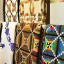 Amish handmade quilts displayed at Old Country Store in Lancaster County PA