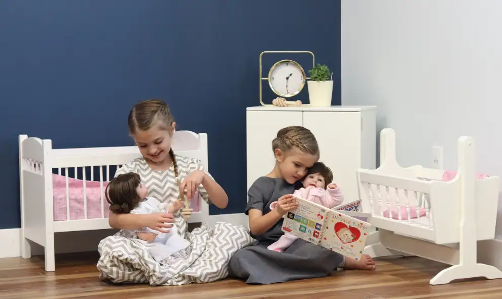Amish Toy Box children playing with wooden doll cribs and toys - handcrafted kids furniture Lancaster PA