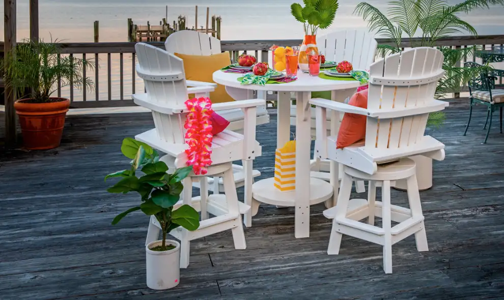 Snyders of Hanover outdoor patio furniture display with Adirondack chairs on waterfront deck - Lancaster PA shopping