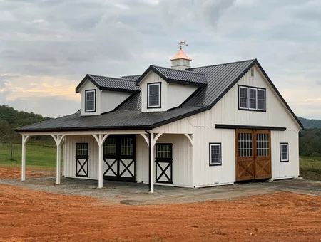 Signature Builders white barn-style home with metal roof and wood carriage doors in Lancaster PA
