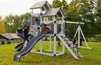 Amish built children's swing set with slide and climbing structure at Lancaster Swing Sets in Lancaster County PA
