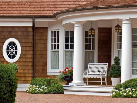 Turntech Premium Wood Turnings white column porch pillars on cedar shake home exterior in Lancaster PA