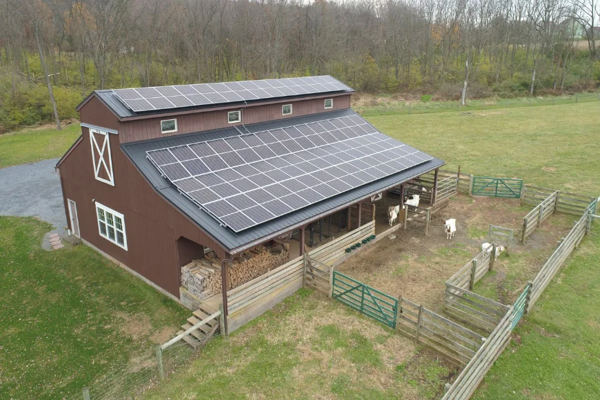 Twilight Renewables solar panel installation on farm barn roof with livestock in Lancaster PA