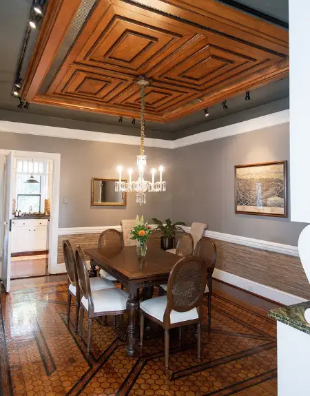 Vacation rental dining room with coffered ceiling and chandelier at Freedom Home in Lancaster PA