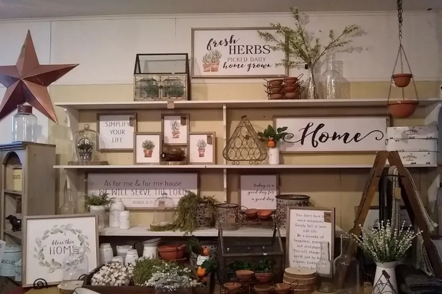 Farmhouse home decor signs and gifts display at Carriage House Furnishings Lancaster PA