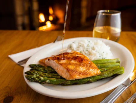 Glazed salmon with rice and asparagus at Smokehouse at Plain & Fancy Farm in Lancaster PA