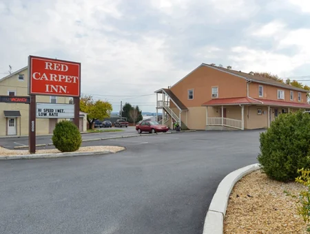 Red Carpet Inn motel exterior and parking lot in the Amish Country region of Lancaster PA