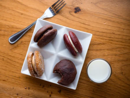 Assorted whoopie pies with milk at Smokehouse at Plain & Fancy Farm in Lancaster PA