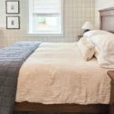 Guest bedroom with wood furniture at Mill Creek Manor, Bird-in-Hand PA