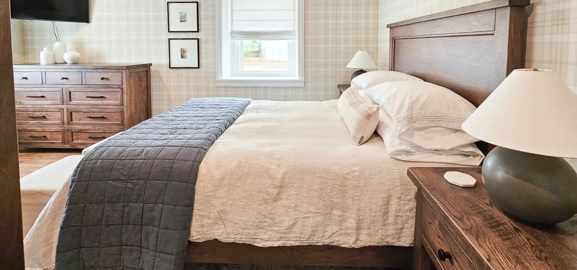 Guest bedroom with wood furniture at Mill Creek Manor, Bird-in-Hand PA