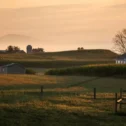 Amish farm at sunrise with corn fields and fog, Bird-in-Hand PA