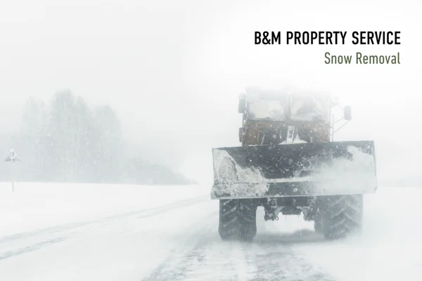 Snow plow clearing road during winter storm, B&M Property Service snow removal in Lancaster County, Pennsylvania