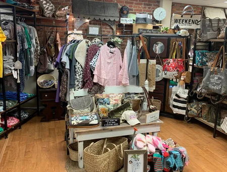 Charlamay's Trinkets and Treasures clothing racks, bags, and accessories displayed in boutique, Lancaster PA