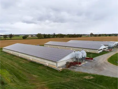 Twilight Renewables aerial view of solar panel roofs on commercial farm buildings in Lancaster PA