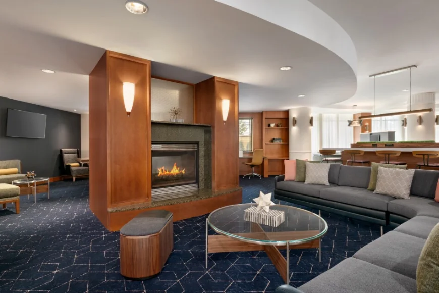 Lobby seating area with fireplace at Courtyard by Marriott Lancaster PA