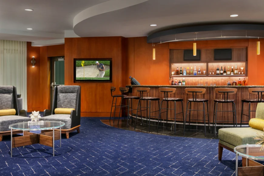 Hotel bar and lounge seating area at Courtyard by Marriott Lancaster PA near Amish attractions