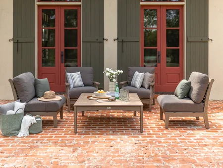 Amish crafted outdoor patio sofa set with coffee table on brick deck at DutchCrafters Lancaster PA