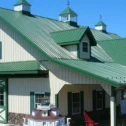 Green metal roof building with cupolas at Conestoga Buildings in Ephrata PA