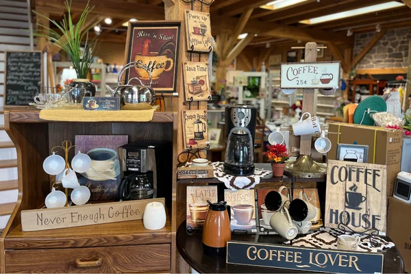 Coffee themed signs and mugs display at Freedom Thrift in Lancaster PA