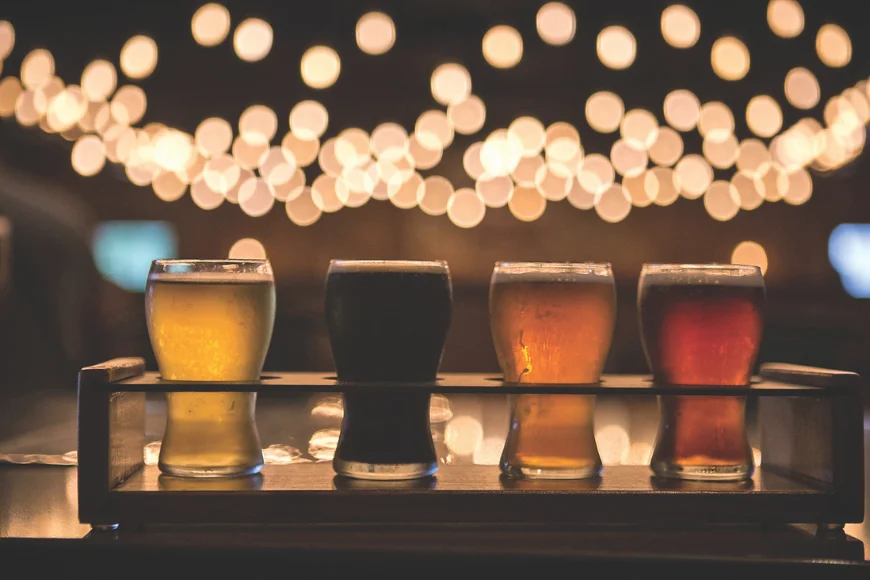 Beer flight of four craft brews at Smokehouse at Plain & Fancy Farm in Lancaster PA