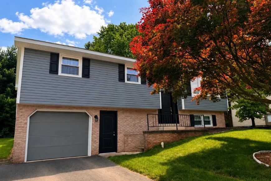 Split level home with new siding and roof by Joyland Roofing in Lancaster PA