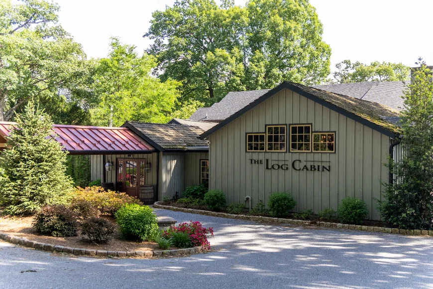 The Log Cabin Restaurant exterior building surrounded by trees in Lancaster PA