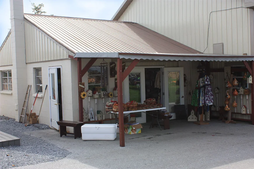 Roadside Amish craft stand with birdhouses on Backroads Bus Tour in Lancaster County, Pennsylvania