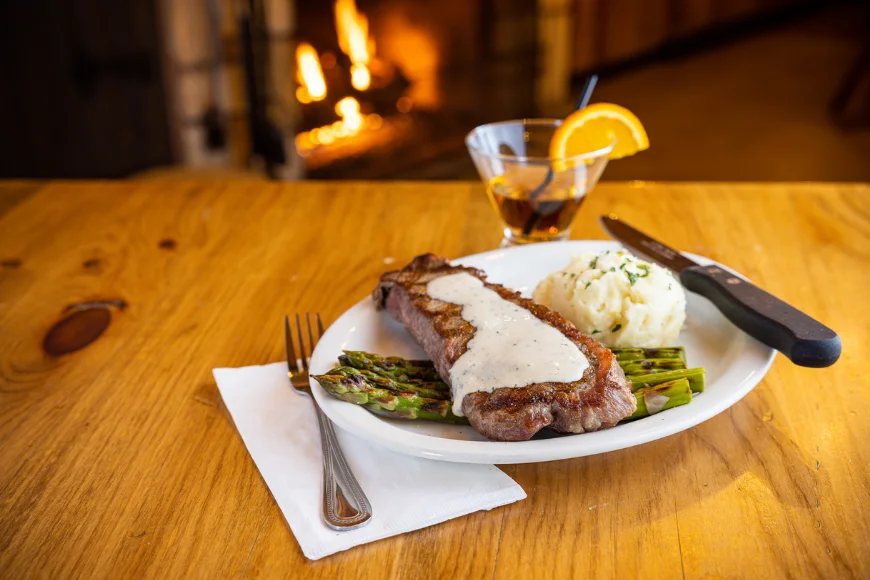 Grilled steak with mashed potatoes and asparagus at Smokehouse at Plain & Fancy Farm in Lancaster PA