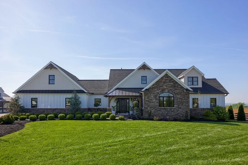 Farmhouse style home with new multi peak roof installed by Edge View Roofing in Lancaster County PA