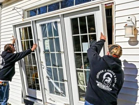 George J. Grove and Son installing patio doors, Lancaster PA contractor