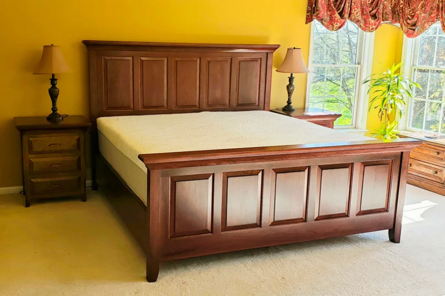 Wooden panel bed frame and nightstand from George's Furniture in Lancaster County PA