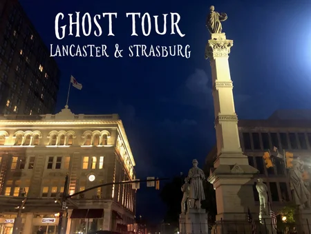 Ghost Tour poster overlooking downtown Lancaster PA monument at night