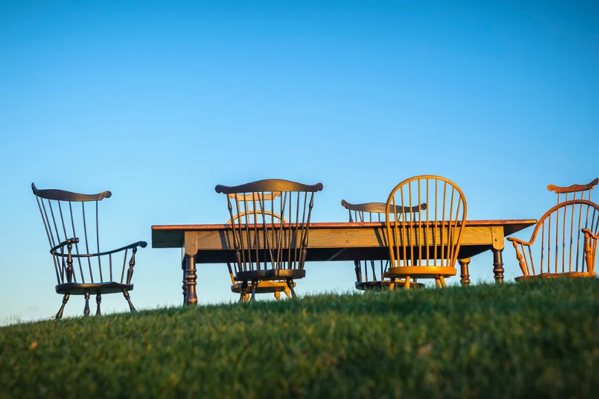 Handcrafted Windsor chairs and farmhouse dining table displayed outdoors at Great Windsor Chairs Lancaster PA