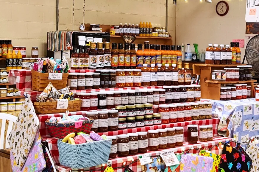 Homemade jams jellies sauces and local goods vendor stand at Green Dragon Farmers Market Lancaster PA