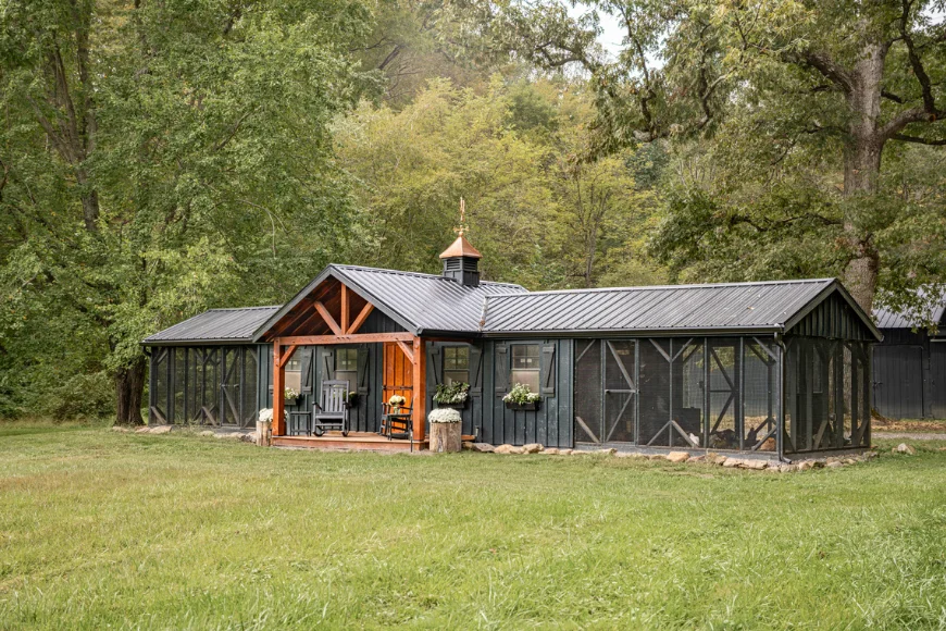 Custom built luxury chicken coop with cupola and porch by The Hen House Collection in Lancaster PA