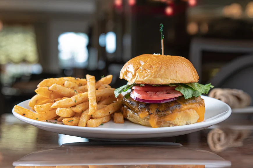 Cheeseburger with lettuce tomato and fries at Huckleberry's Restaurant and Tavern Lancaster PA