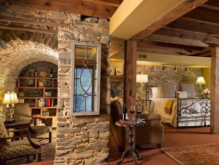 Bedroom with stone archways and wine service at The Inn at Leola Village in Lancaster PA