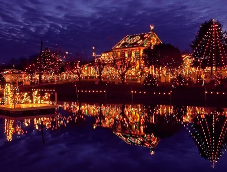 Christmas lights reflecting in water at Koziar's Christmas Village in Lancaster PA