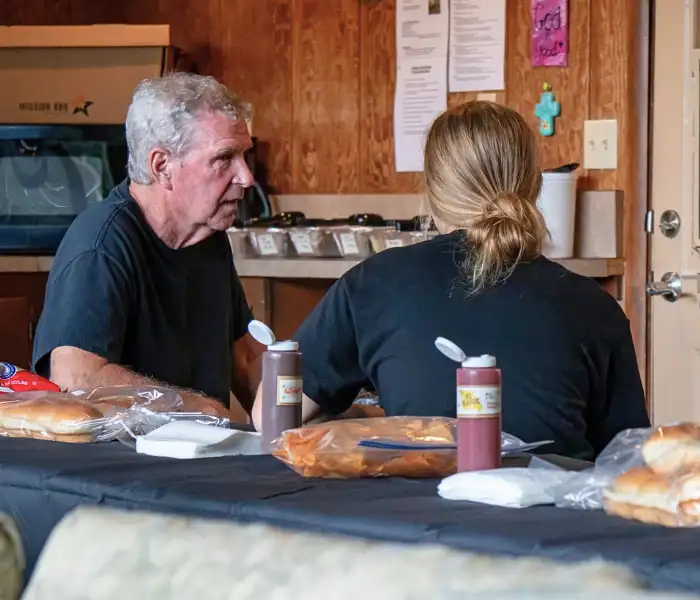 Volunteers preparing sandwiches at community meal site in Lancaster PA